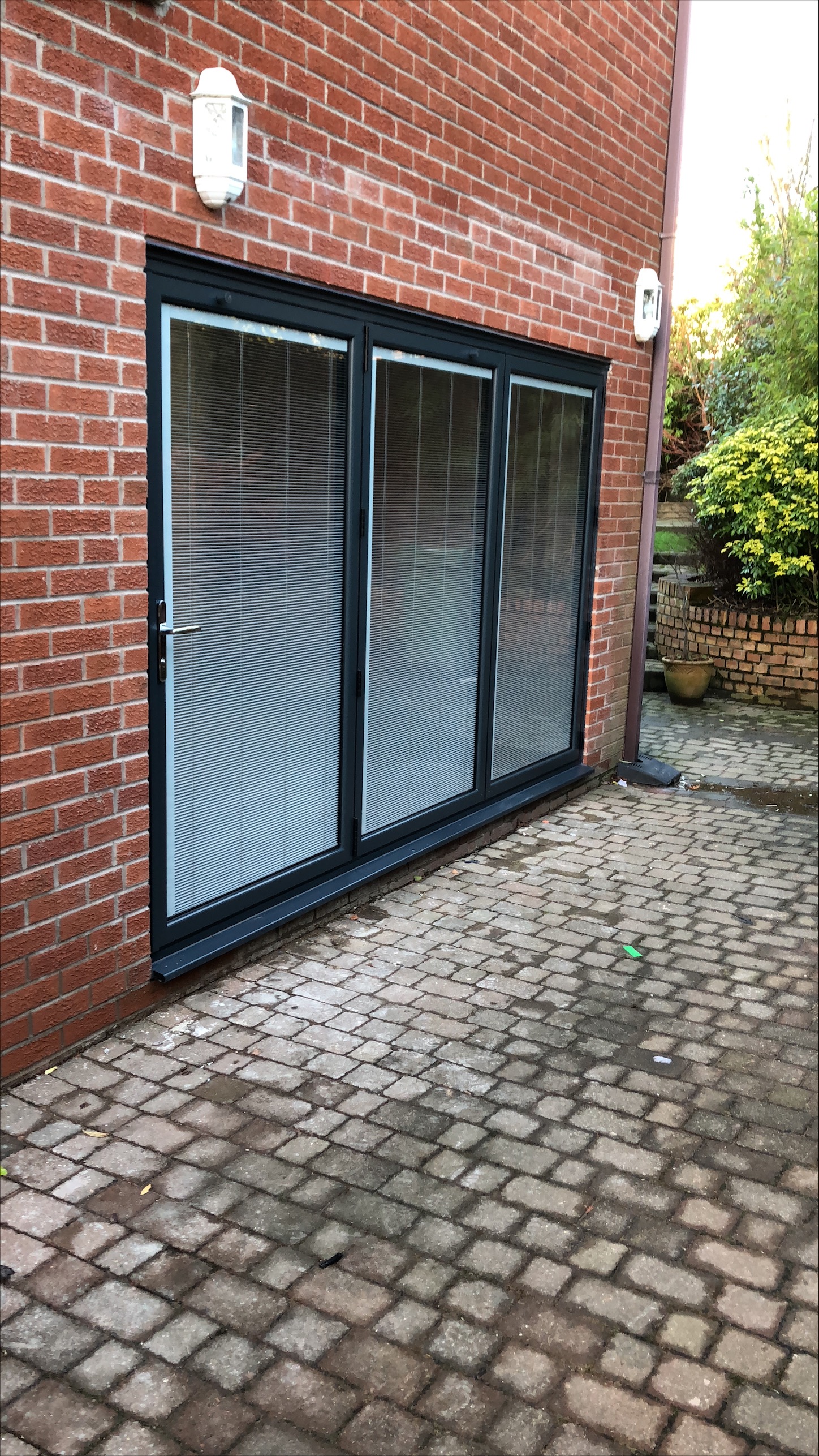 Anthracite grey bi-fold patio doors installation
