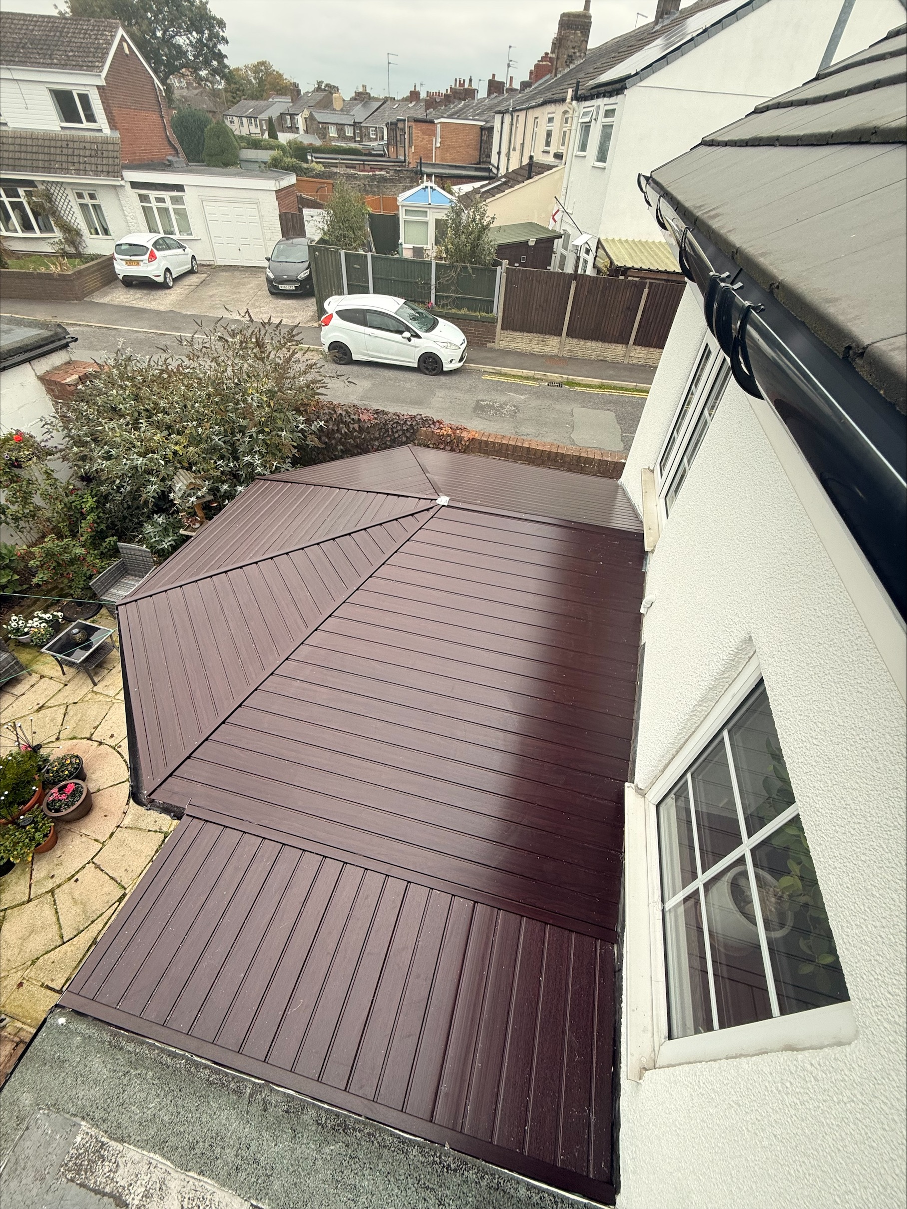 Conservatory with solid tiled roof replacement